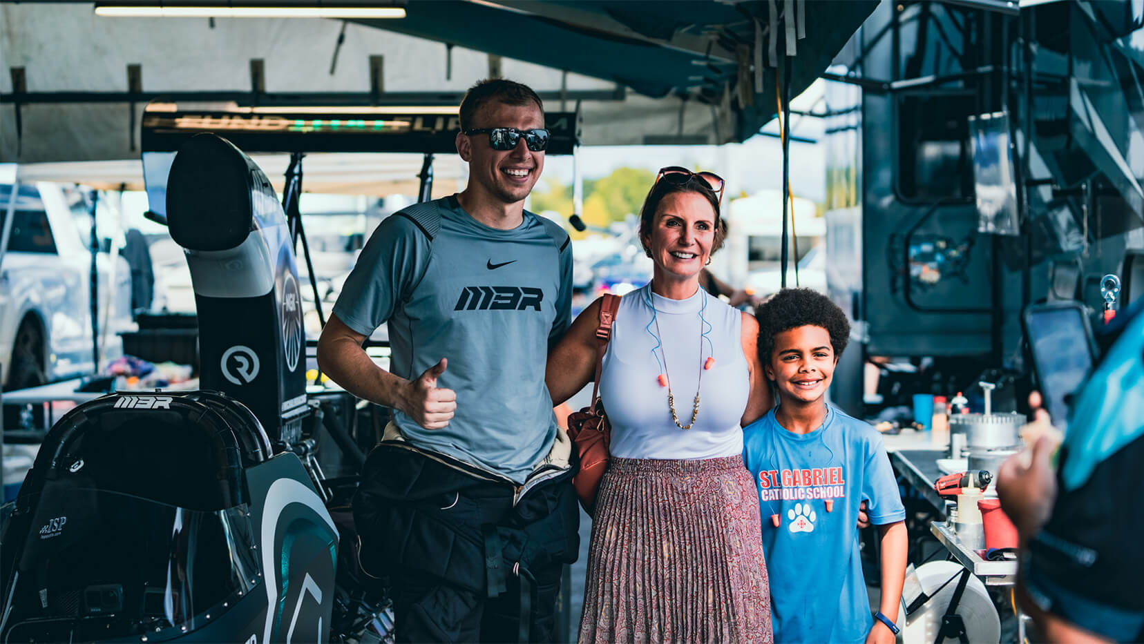 Michalek Brothers Racing driver Corey Michalek with Fund That Flip guests at the 2021 NHRA Carolina Nationals.